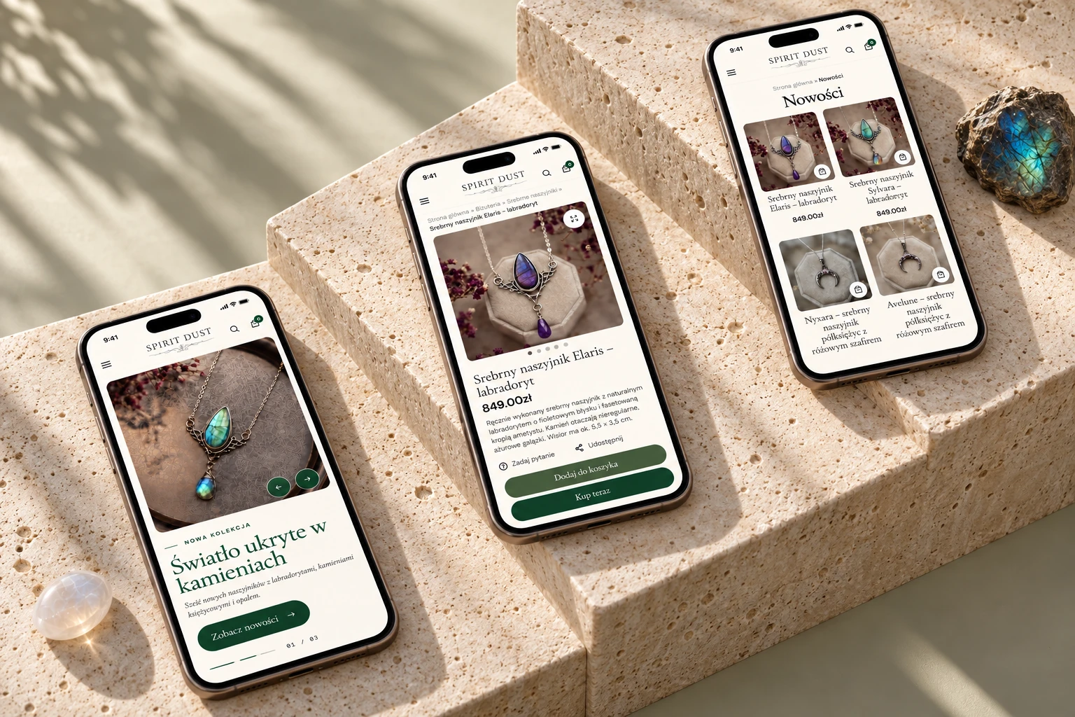 Three phones on pale travertine steps, showing the Spirit Dust homepage, Elaris necklace product page and new jewelry collection